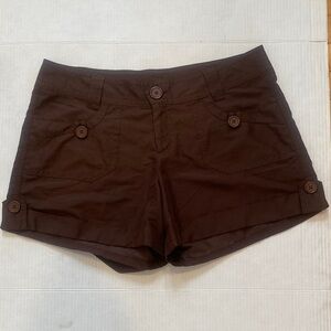 SKYE 
Chocolate brown shorts with front and back pockets polyester size large